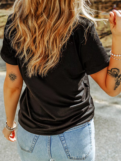 Chenille pumpkin graphic detail on black T-shirt