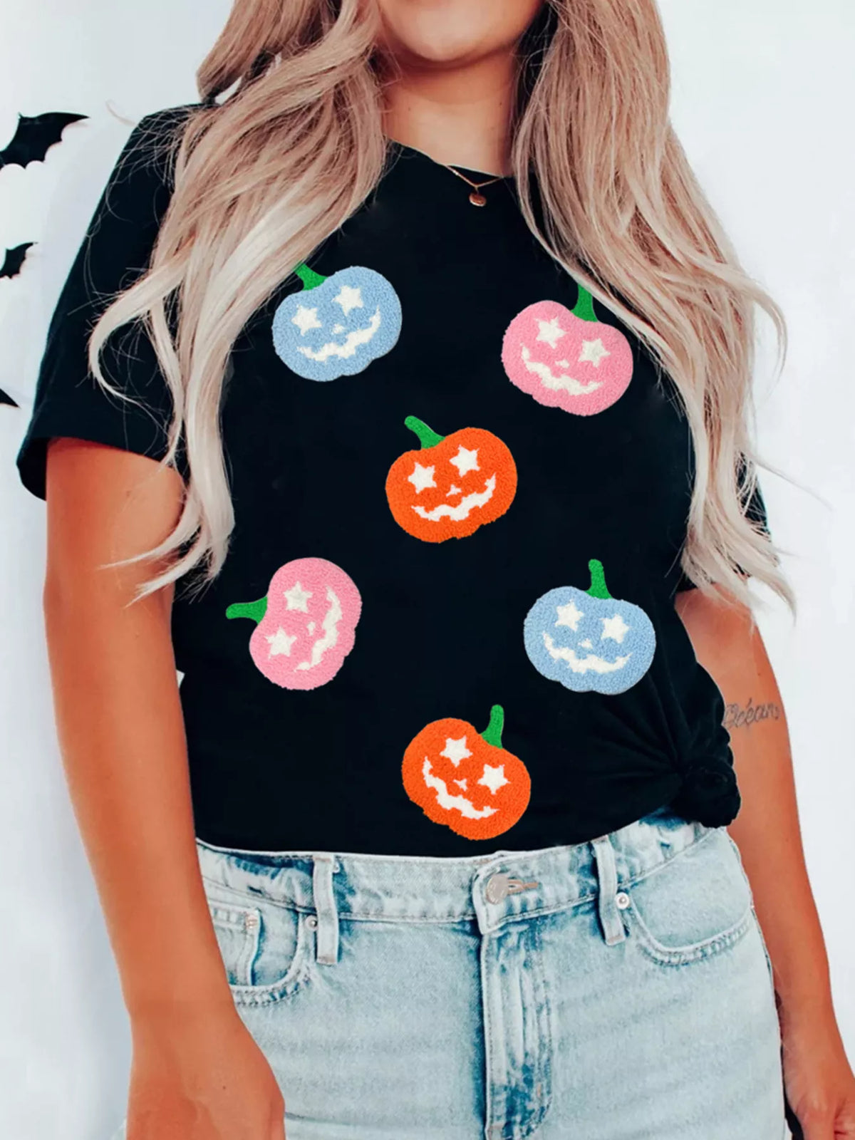 Halloween pumpkin T-shirt styled for a casual look