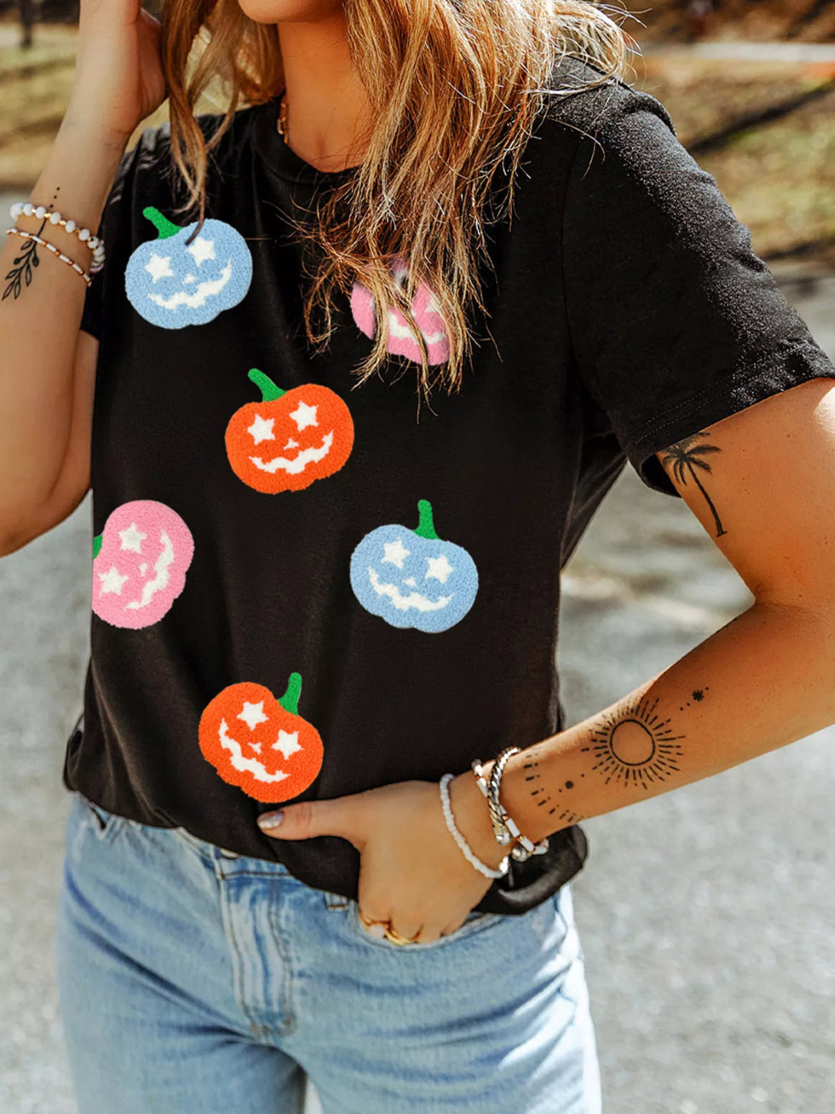Black Halloween T-shirt with chenille pumpkin graphic